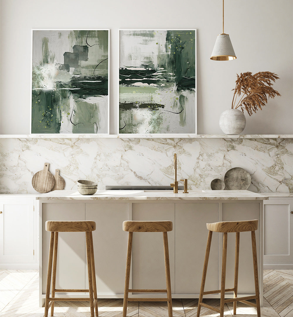 Modern kitchen with marble backsplash, abstract art, and wooden stools.
