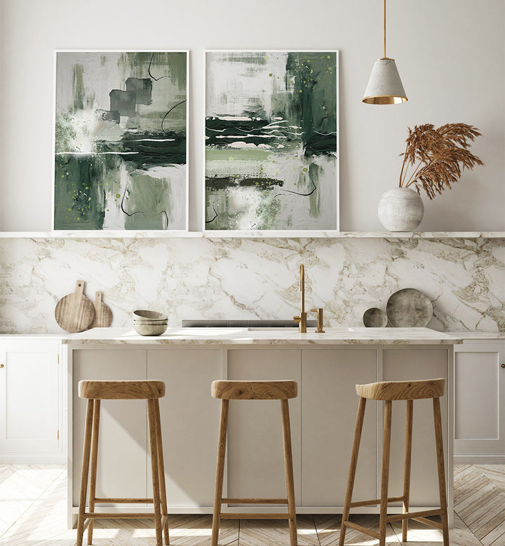 Modern kitchen with marble backsplash, abstract art, and wooden stools.