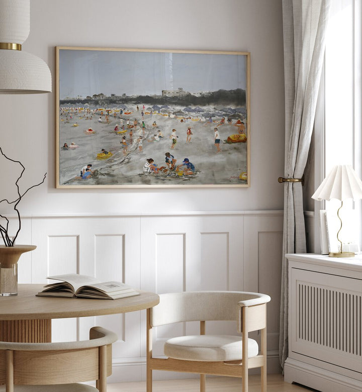 Colorful BEACH STORY, BEACH PAINTINGS adorn a stylish room, showcasing vibrant scenes of beachgoers enjoying summer fun.