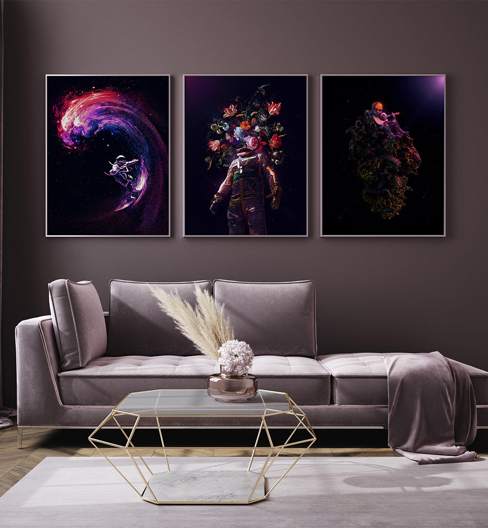 Modern living room with a gray sofa and three abstract art pieces on the wall.