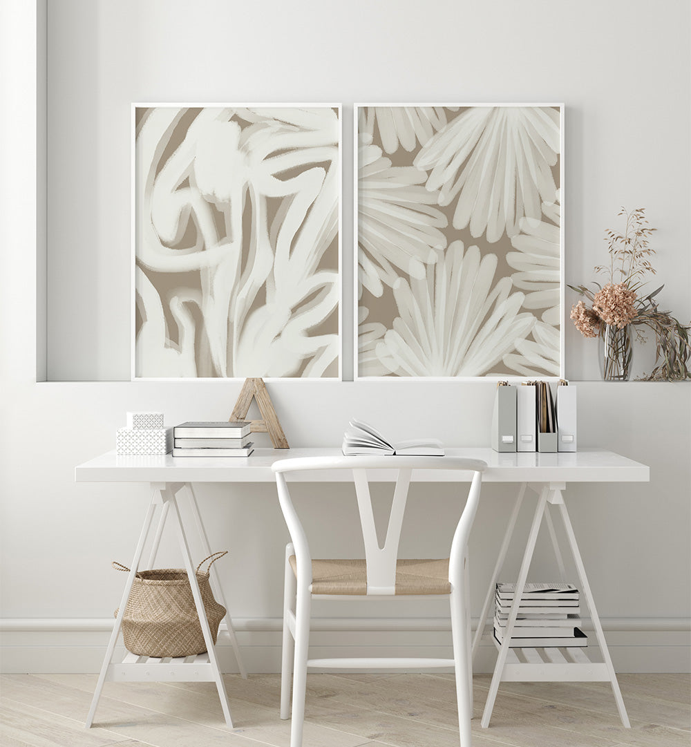 Modern interior with abstract wall art above a white desk.