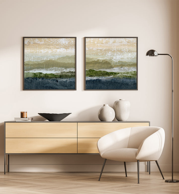 Modern interior with a wooden sideboard, white chair, and abstract wall art.