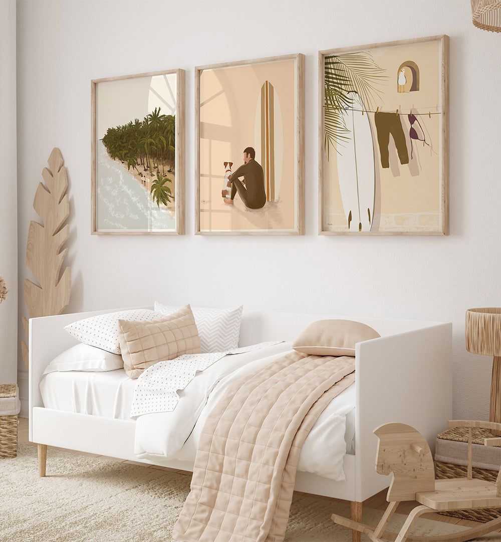 Neatly made bed with white bedding and beige blanket in a room with wall art and decor.