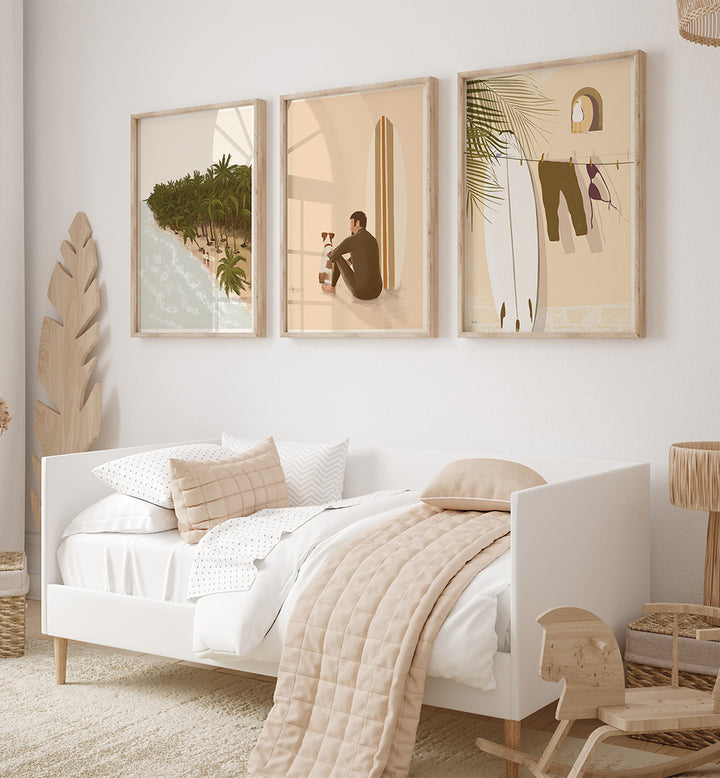 Neatly made bed with white bedding and beige blanket in a room with wall art and decor.