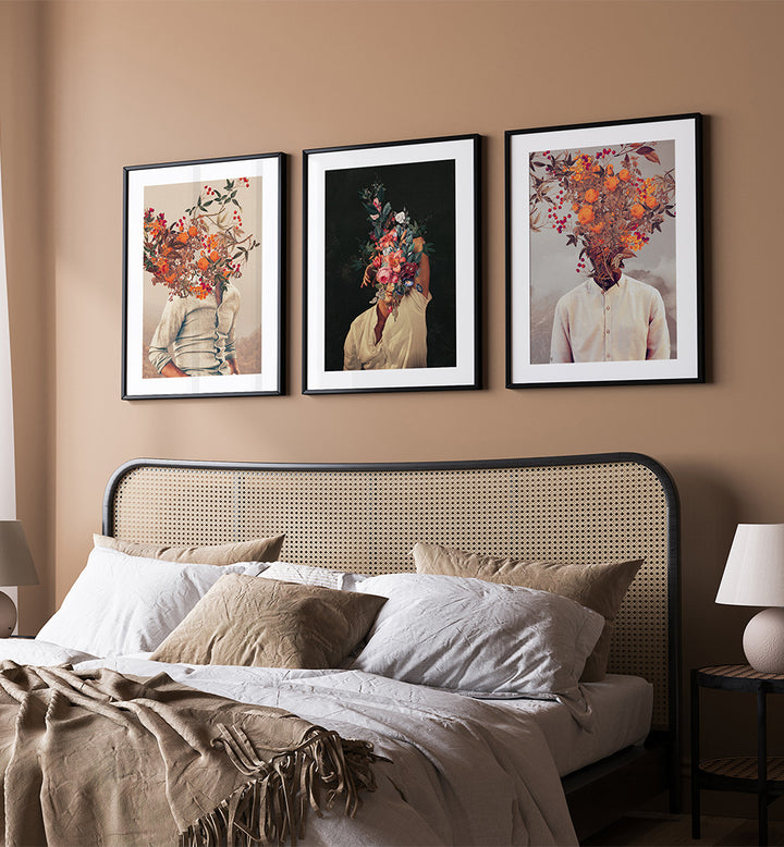 Bedroom with a bed and wall art featuring floral and human elements.