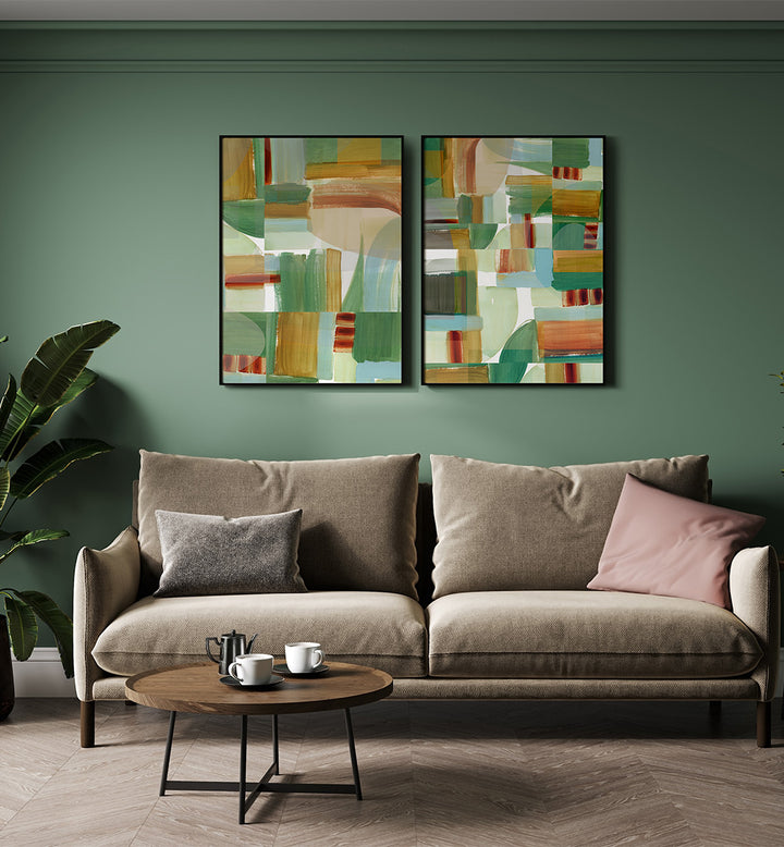 Living room with a beige sofa, round coffee table, and abstract wall art.