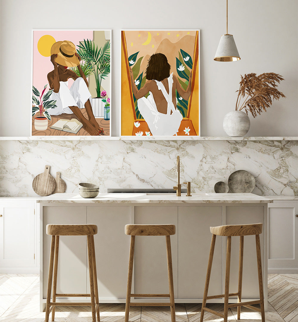 Kitchen interior with marble backsplash, wooden stools, and two wall art pieces.