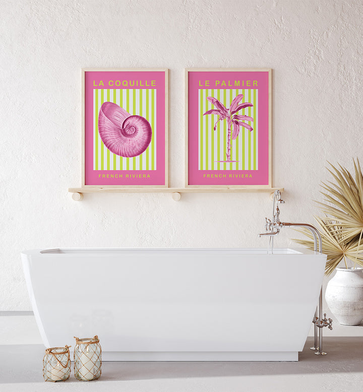 Two framed prints of a shell and palm tree on a wall above a bathtub.