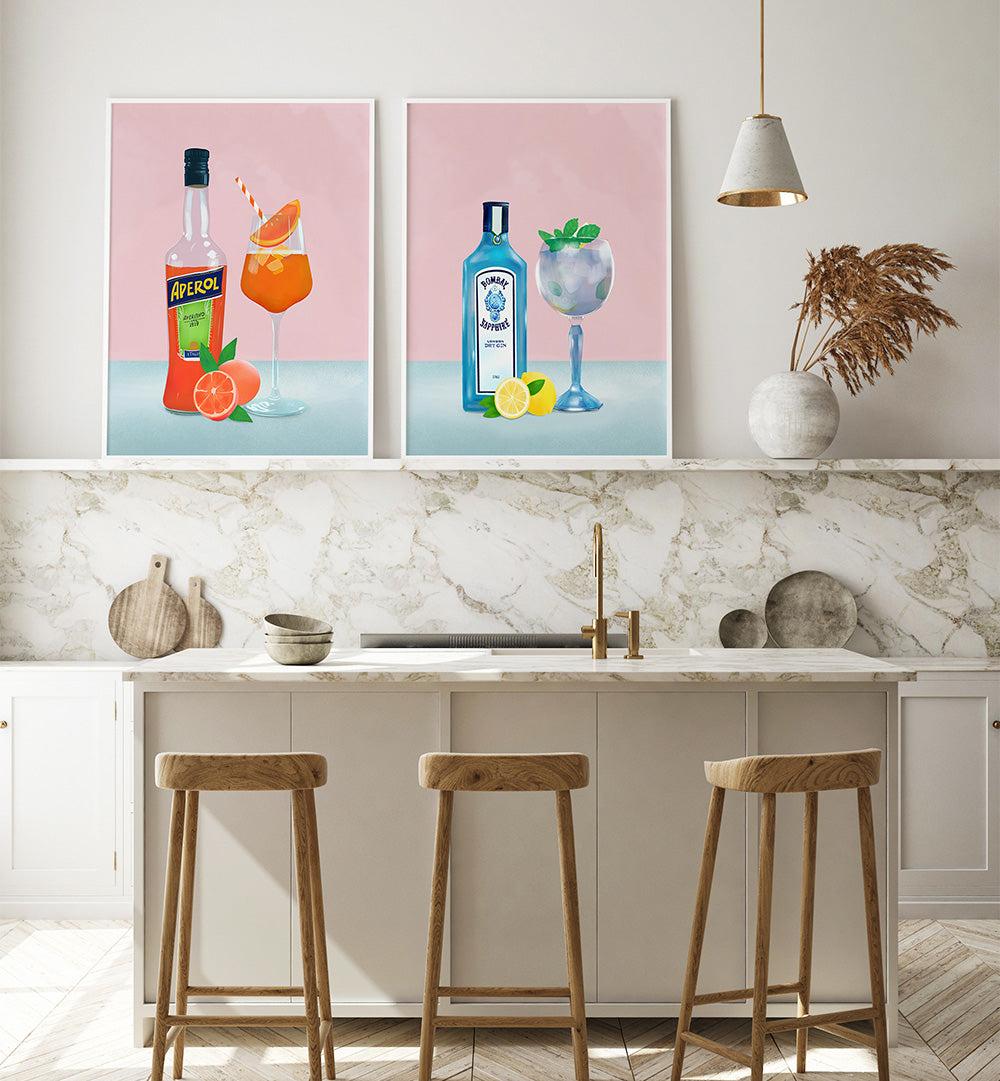 Kitchen interior with bar stools and two framed artworks on the wall.