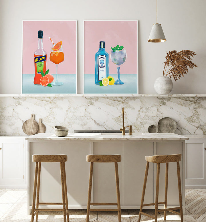 Kitchen interior with bar stools and two framed artworks on the wall.