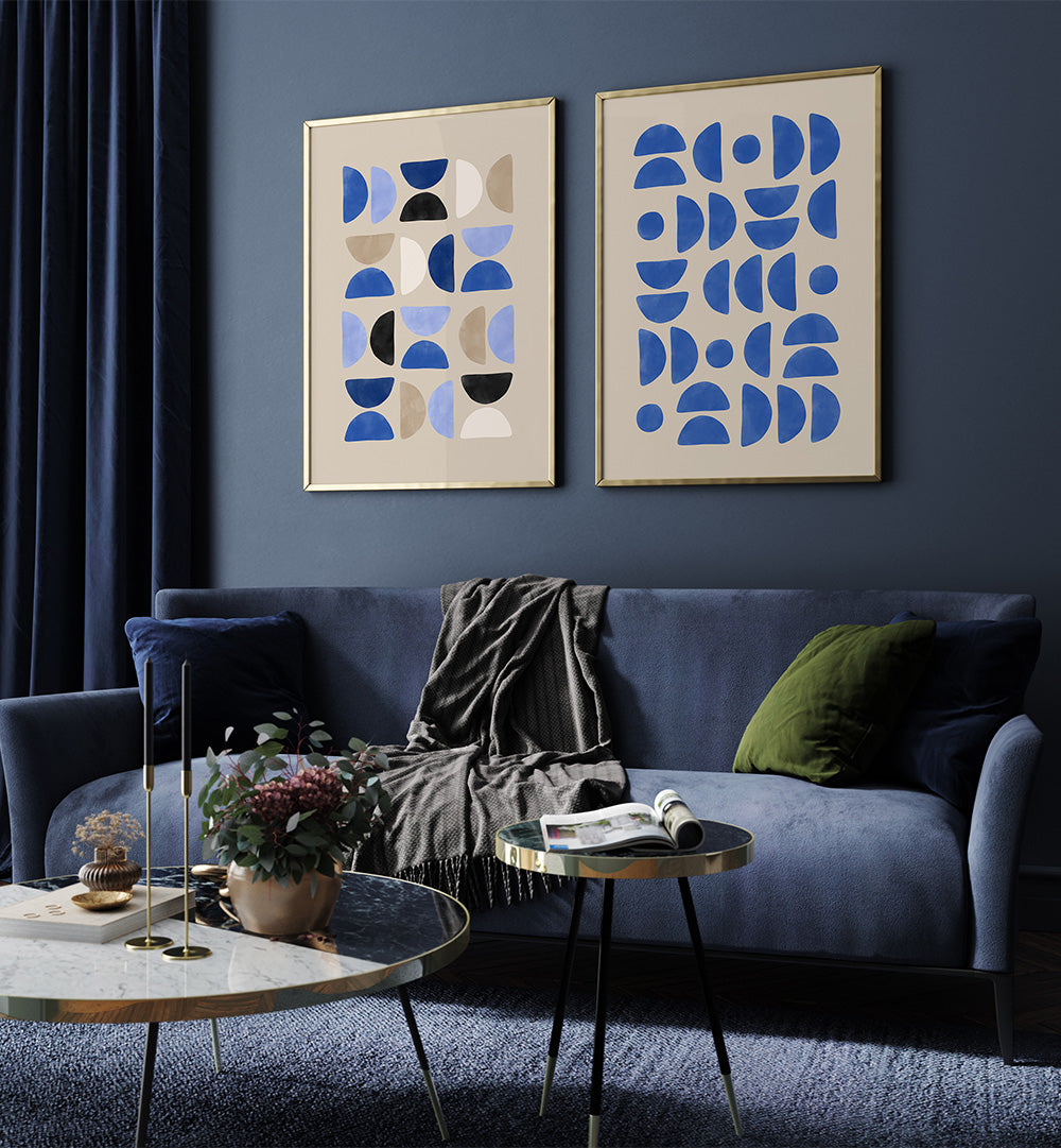 Modern living room with blue sofa, abstract wall art, and decorative items.
