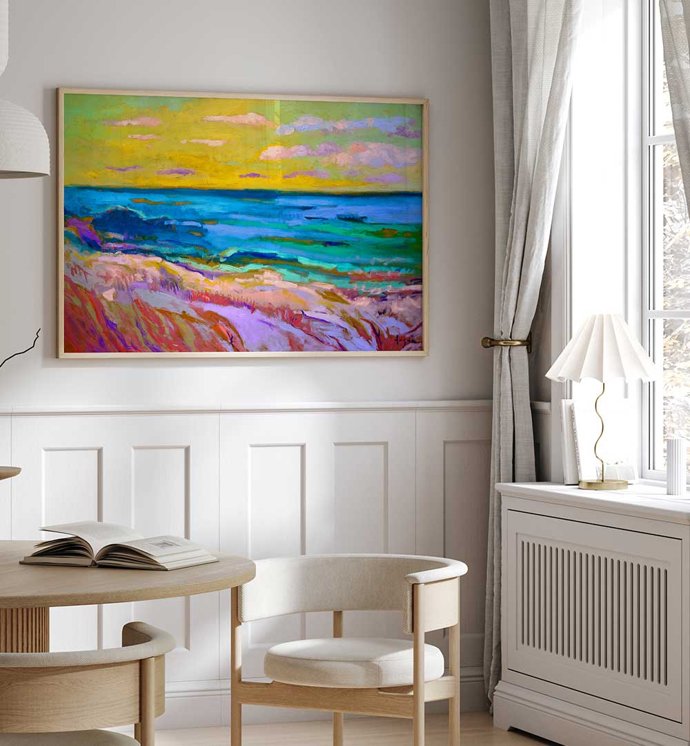 Framed COASTAL  SUNSET , LANDSCAPE PAINTINGS of vibrant shoreline and twilight sea above a cozy dining nook