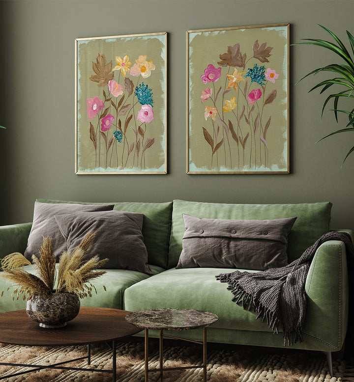 Green sofa with floral artwork on a green wall
