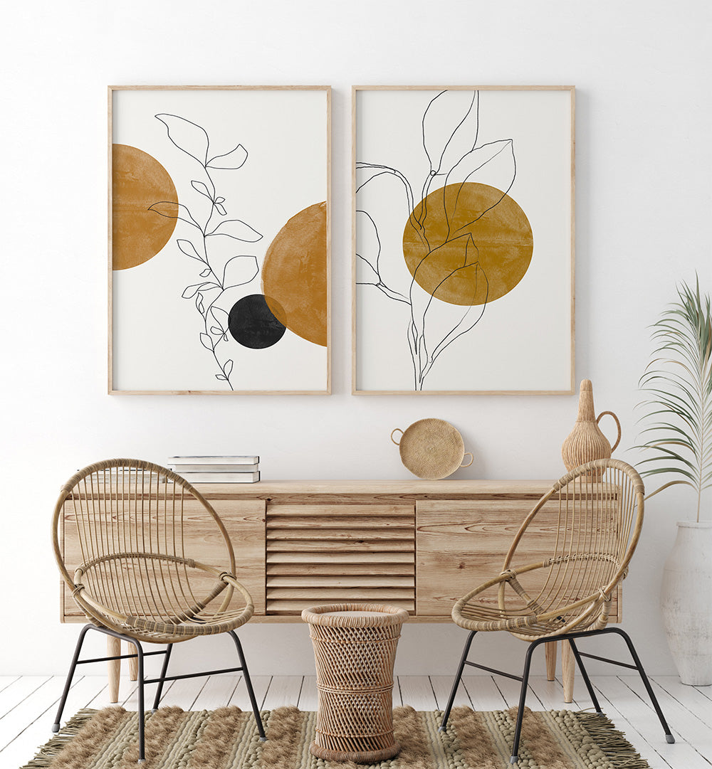 Dining area with wooden console table, wicker chairs, and abstract wall art.