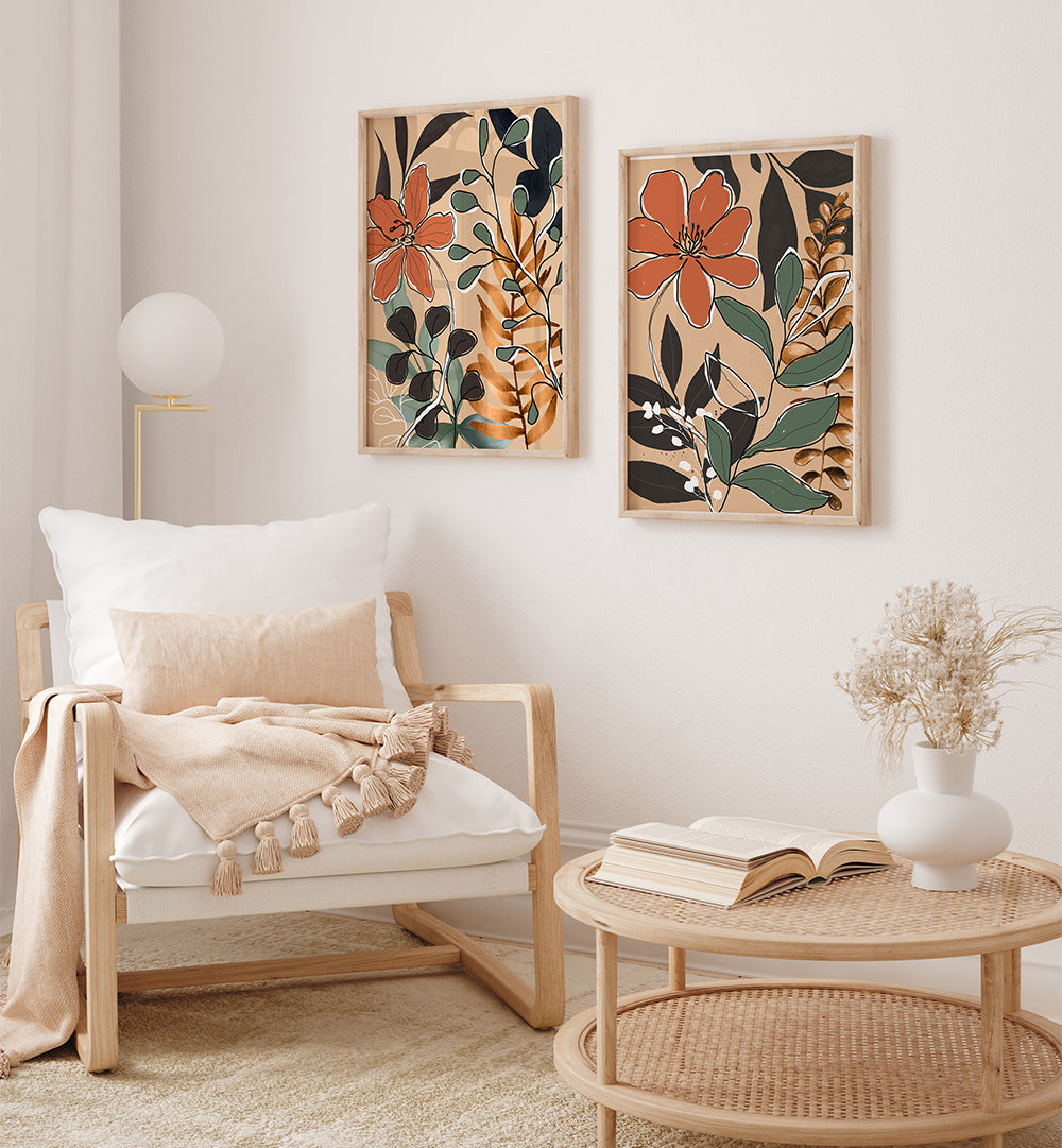 Living room with a wooden armchair, floral wall art, and a small table with a book and vase.