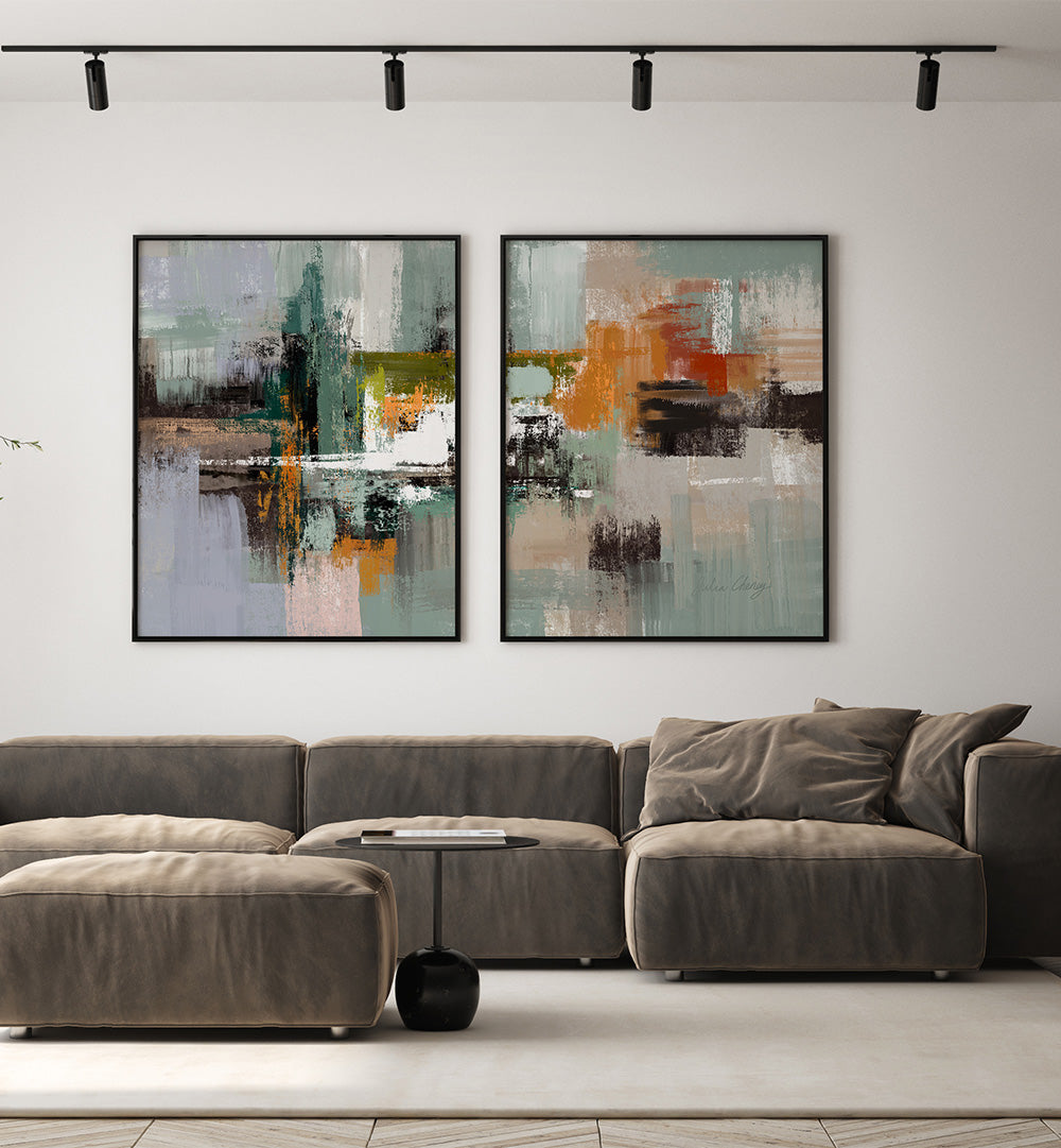 Modern living room with a gray sectional sofa and abstract paintings on the wall.