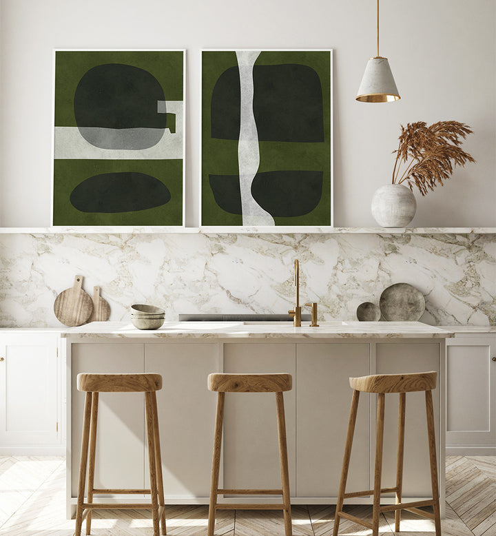 Modern kitchen with abstract art on the wall, marble countertop, and wooden stools.