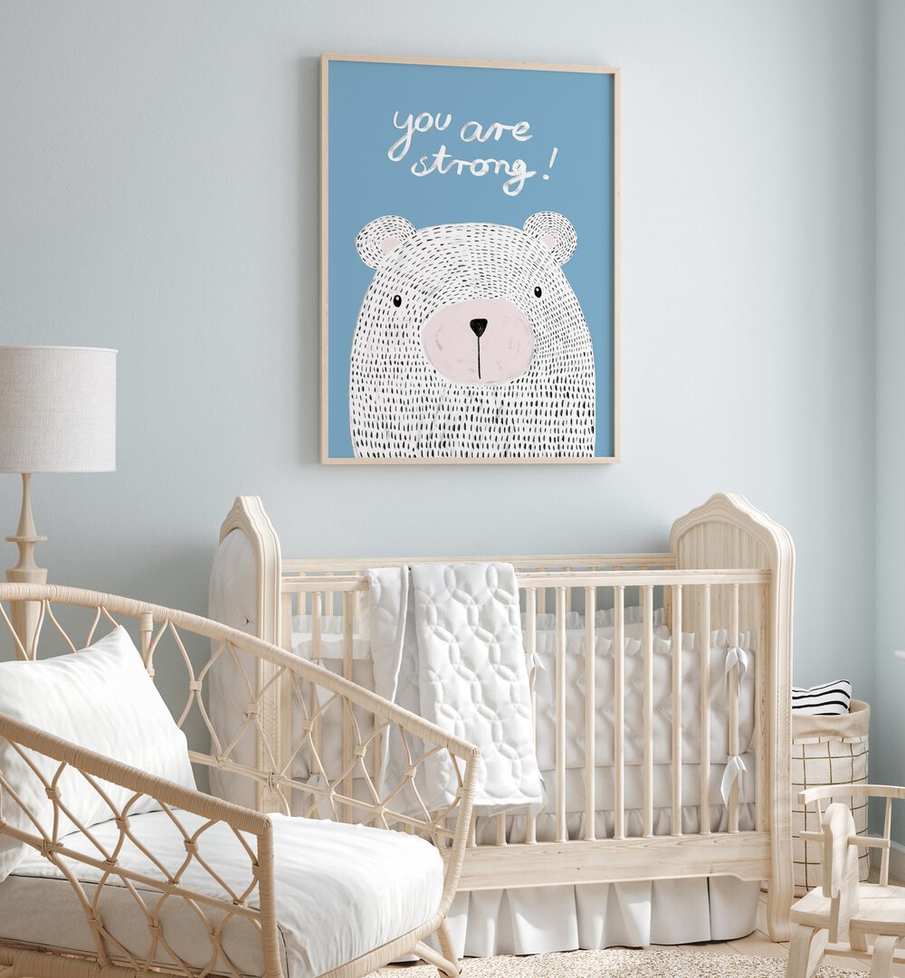 Bright kids room featuring "YOU ARE STRONG, KIDS ROOM PAINTINGS" with a bear illustration, perfect for inspiration.