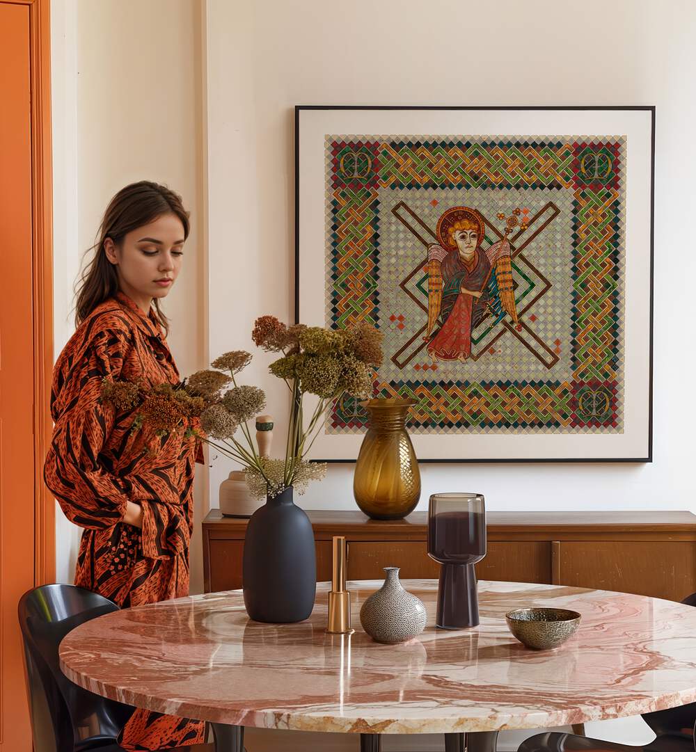 Elegant decor showcasing the BOOK OF KELLS MATTHEW, PORTRAITS illustration above a stylish table arrangement.