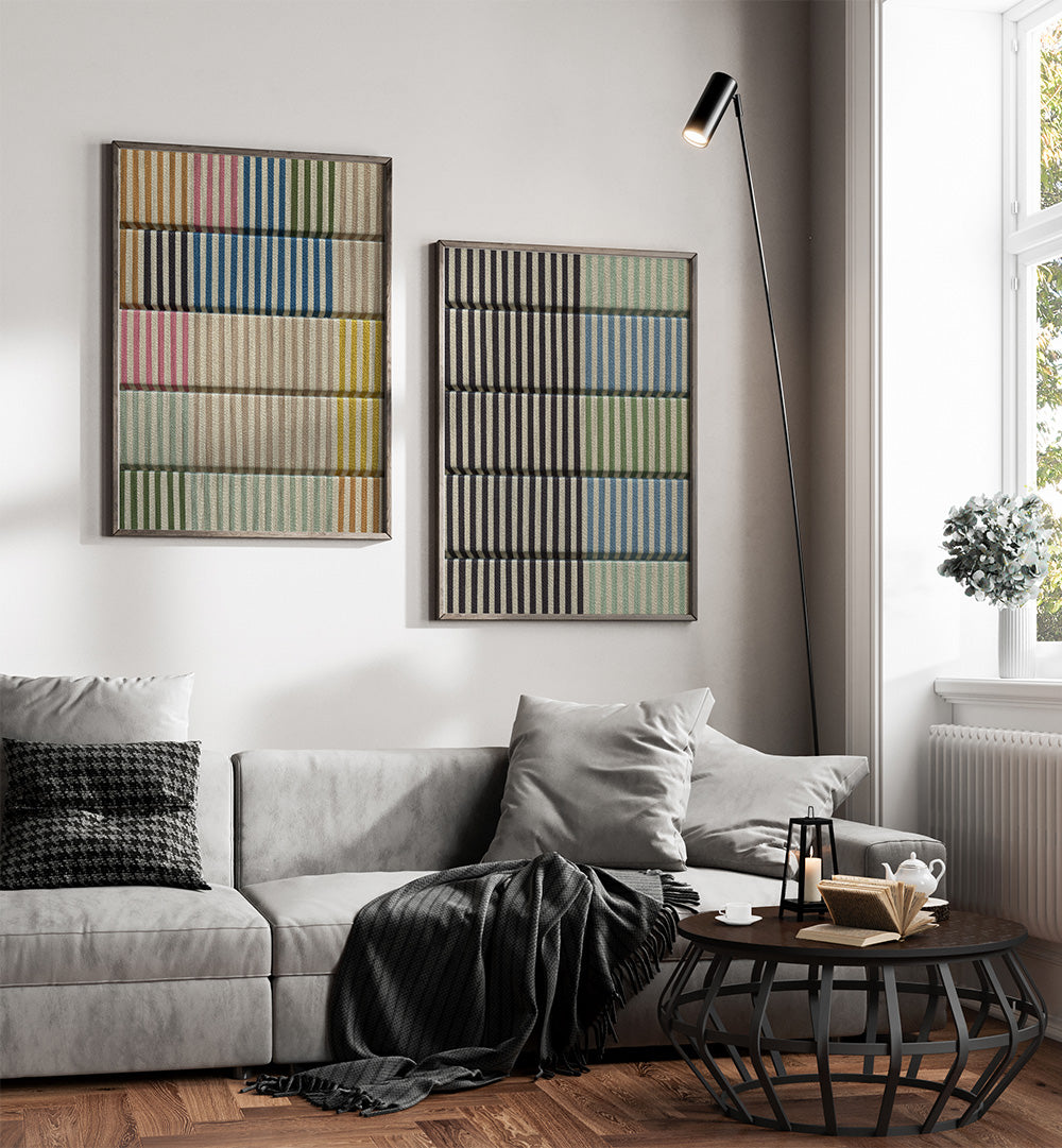 Modern living room with a gray sofa, coffee table, and abstract wall art.