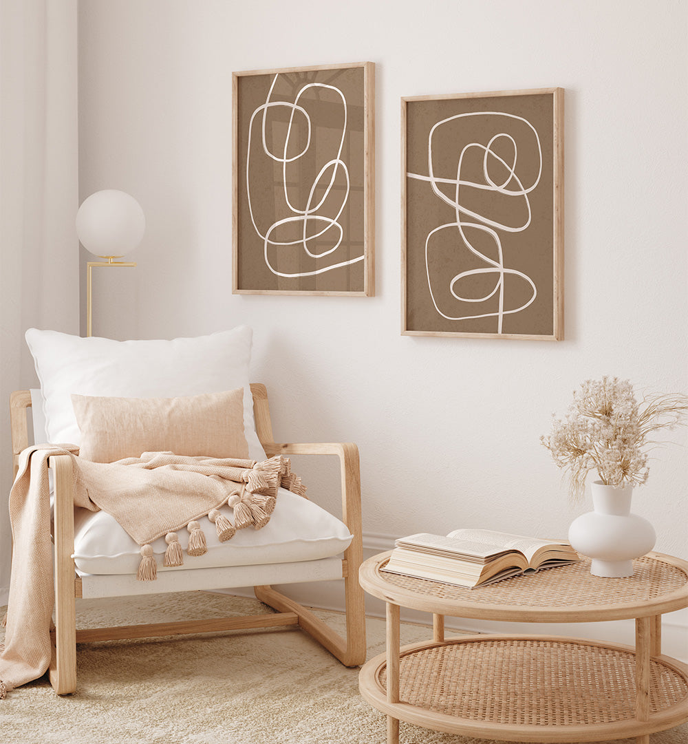 Modern living room with abstract wall art, a wooden chair, and a small table.