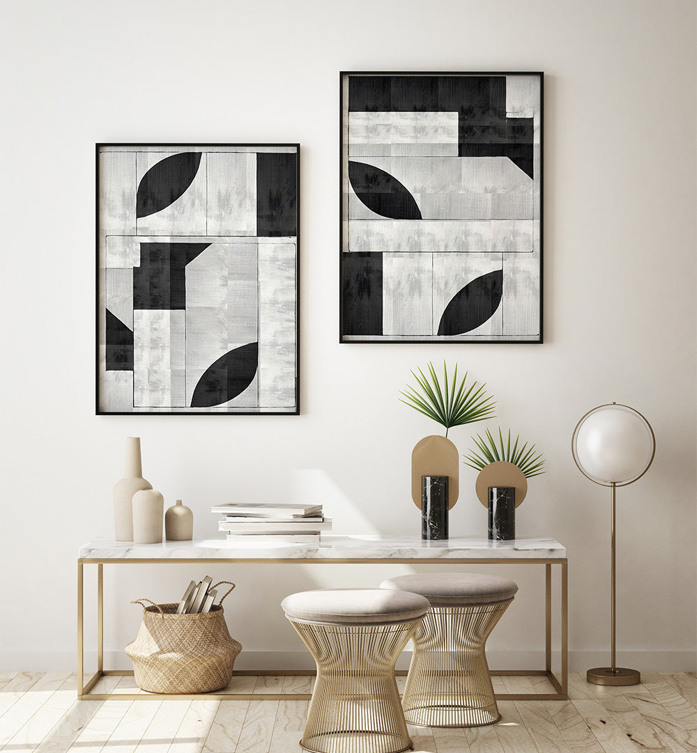 Modern interior with abstract wall art, a console table, and decorative items.