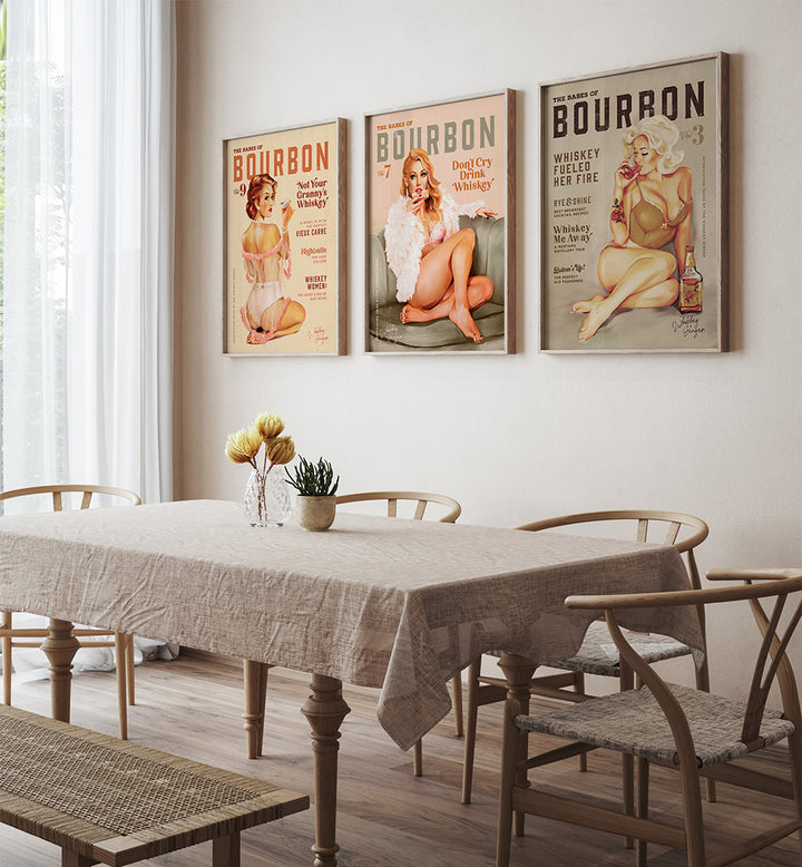 Dining room with framed vintage bourbon posters on the wall.