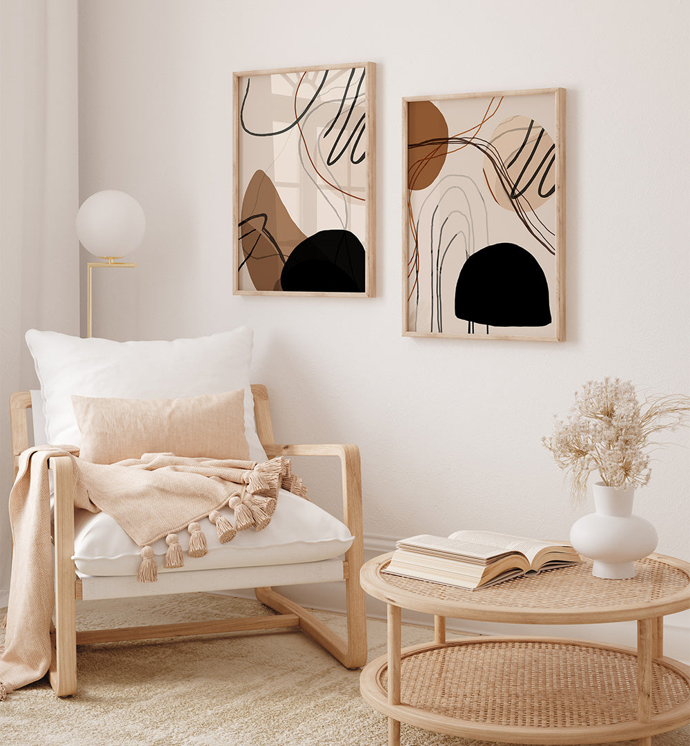 Modern living room with a wooden armchair, coffee table, and abstract wall art.