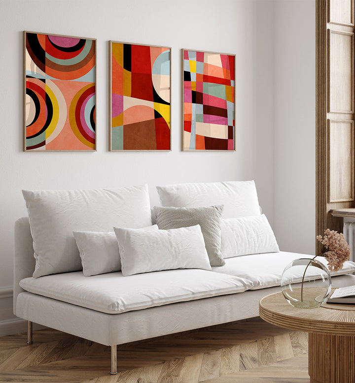 Modern living room with a white sofa and abstract wall art