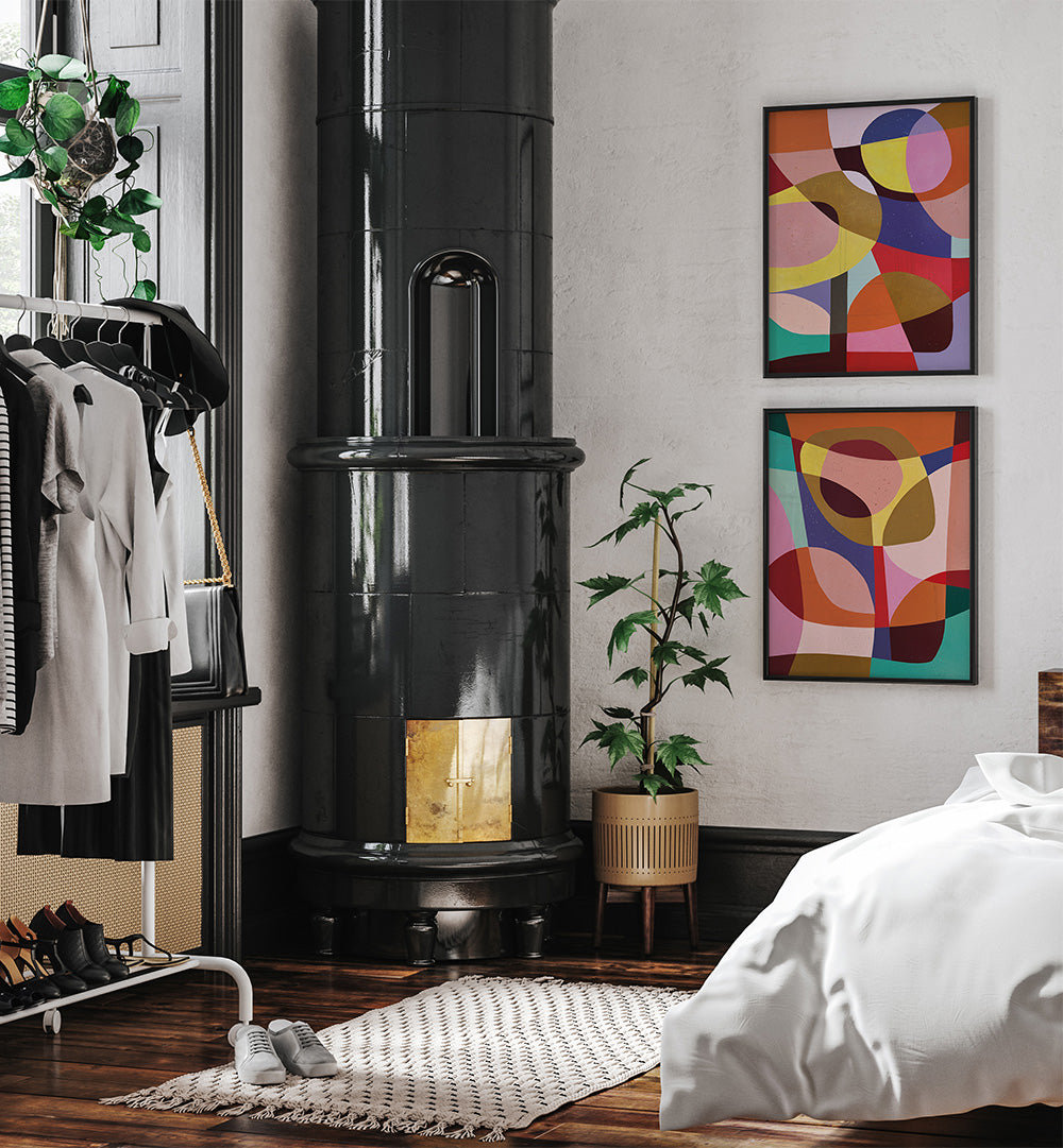 Modern bedroom with black wood-burning stove, colorful abstract art, and a bed.