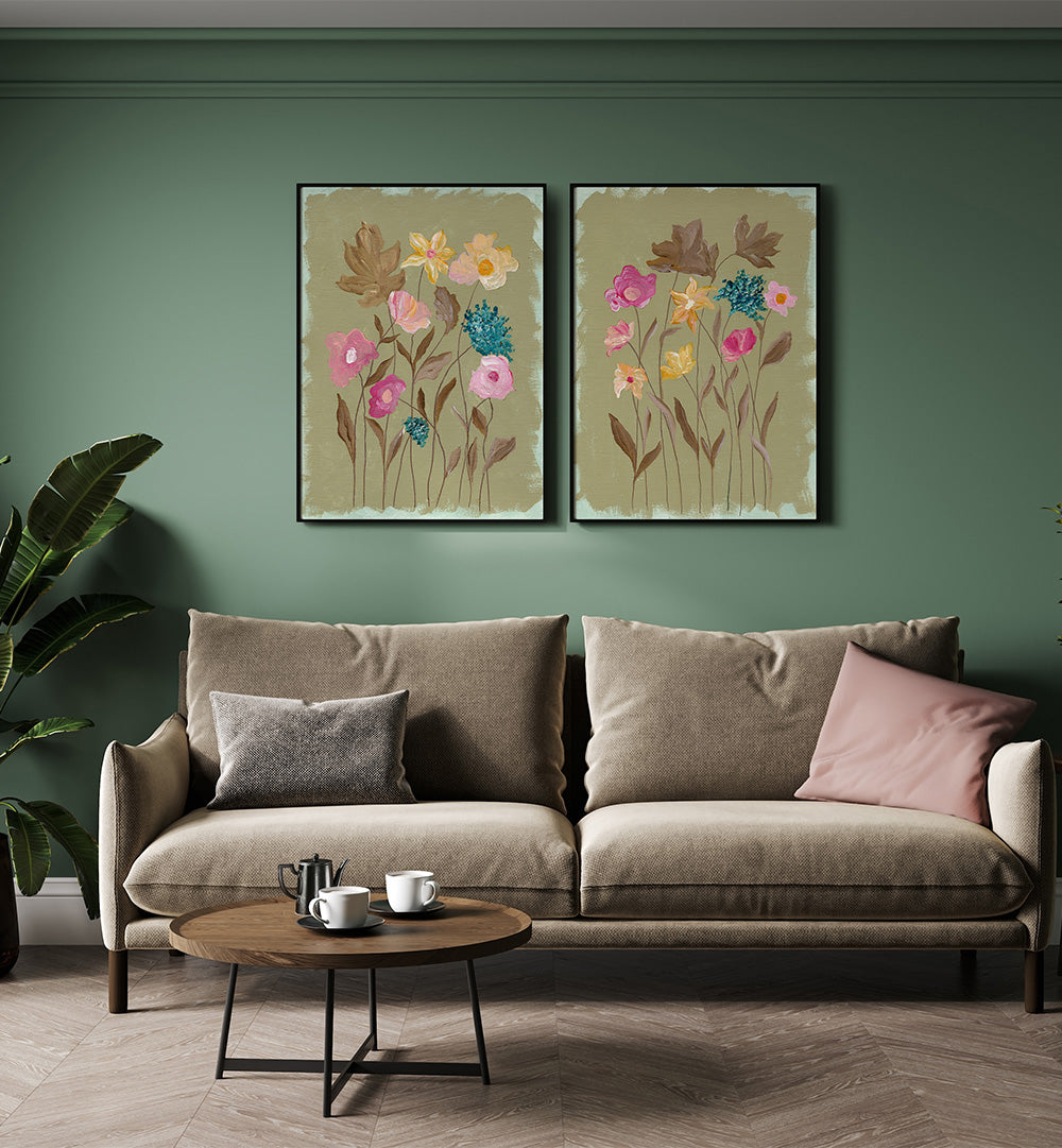 Living room with a beige sofa, round coffee table, and floral wall art on a green wall.