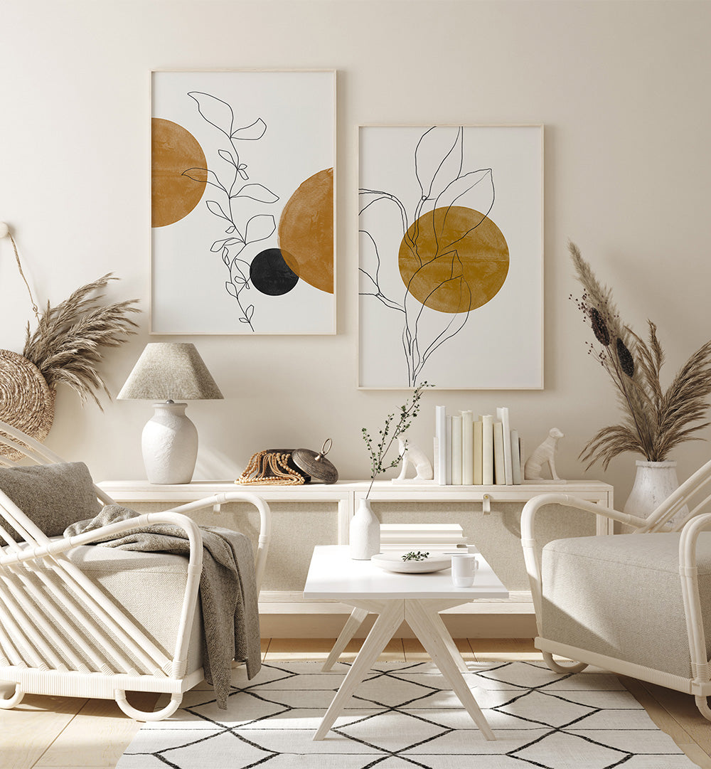 Modern living room with abstract wall art, white furniture, and decorative plants.