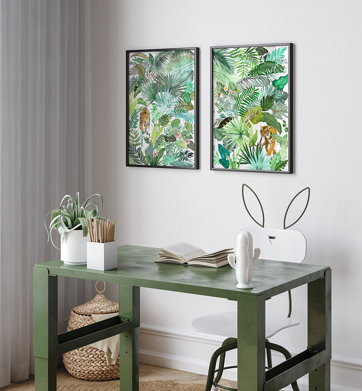 Green desk with decorative items against a wall with framed tropical-themed artwork.