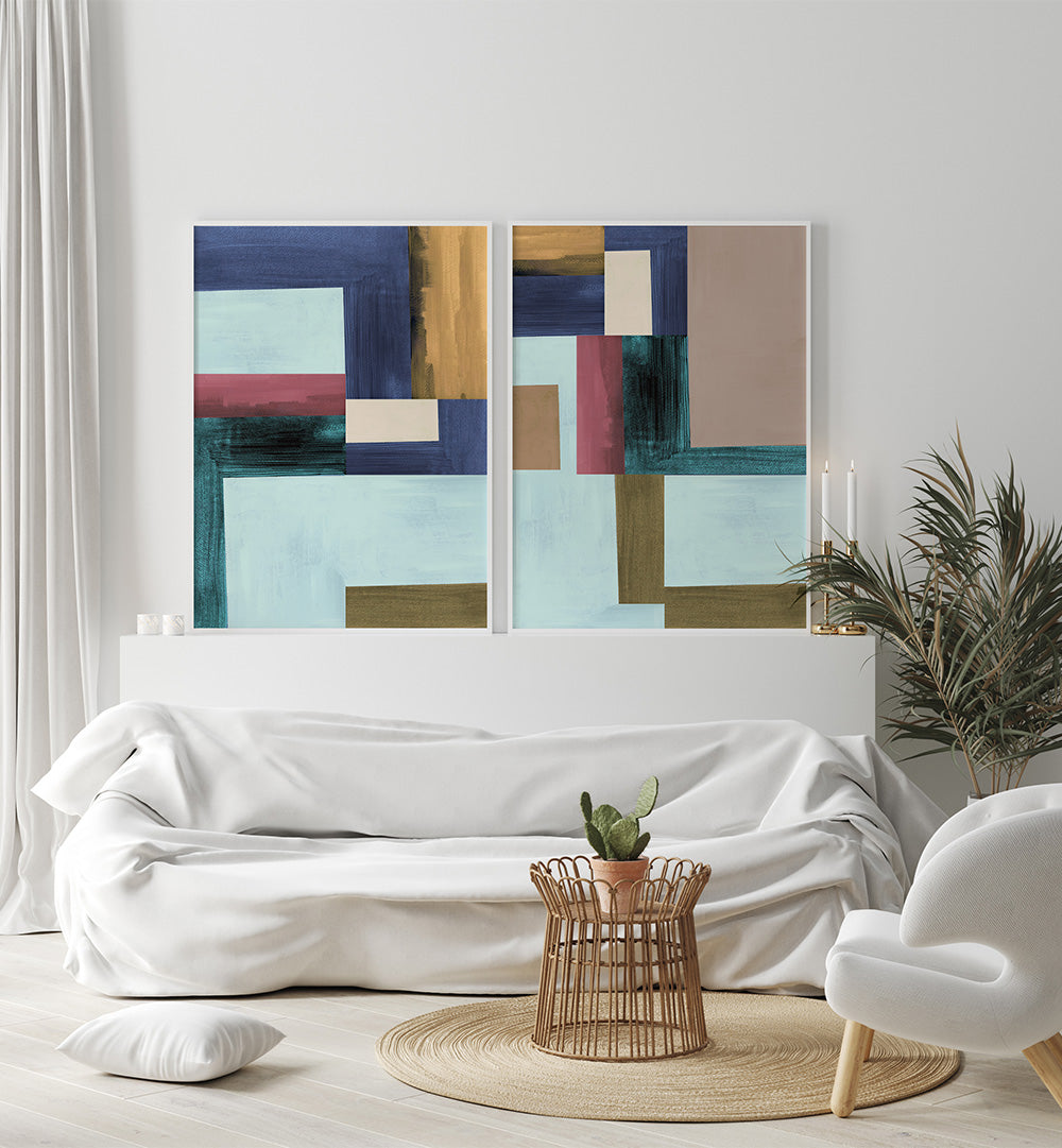 Modern living room with abstract art on the wall and a white sofa.