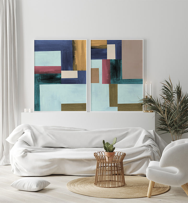 Modern living room with abstract art on the wall and a white sofa.