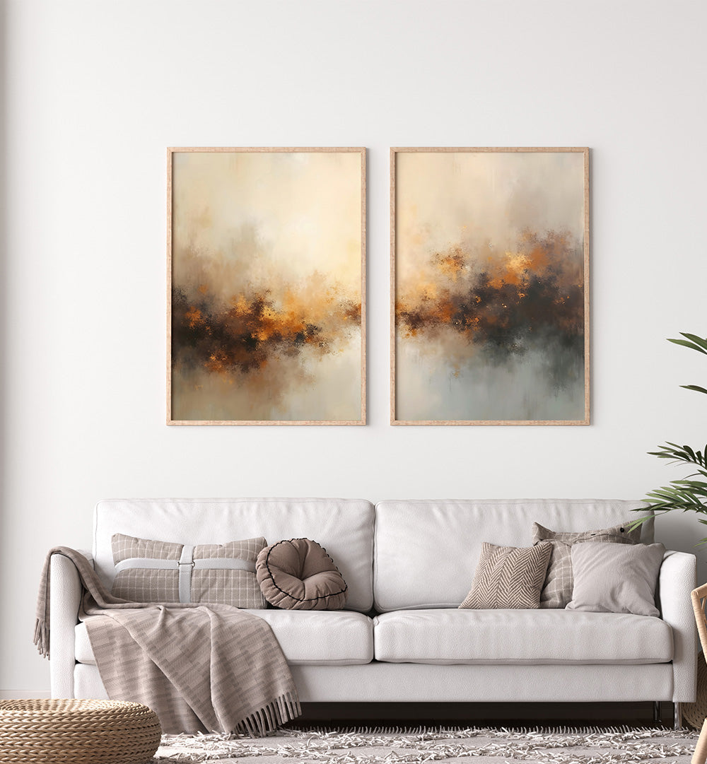Two abstract paintings above a white sofa in a living room.