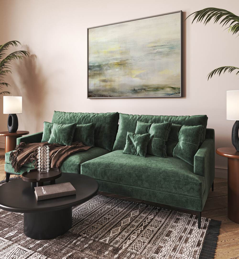 Elegant living room featuring a BLEND OF MUTED TONES, ABSTRACT PAINTINGS above a stylish green couch and modern decor.