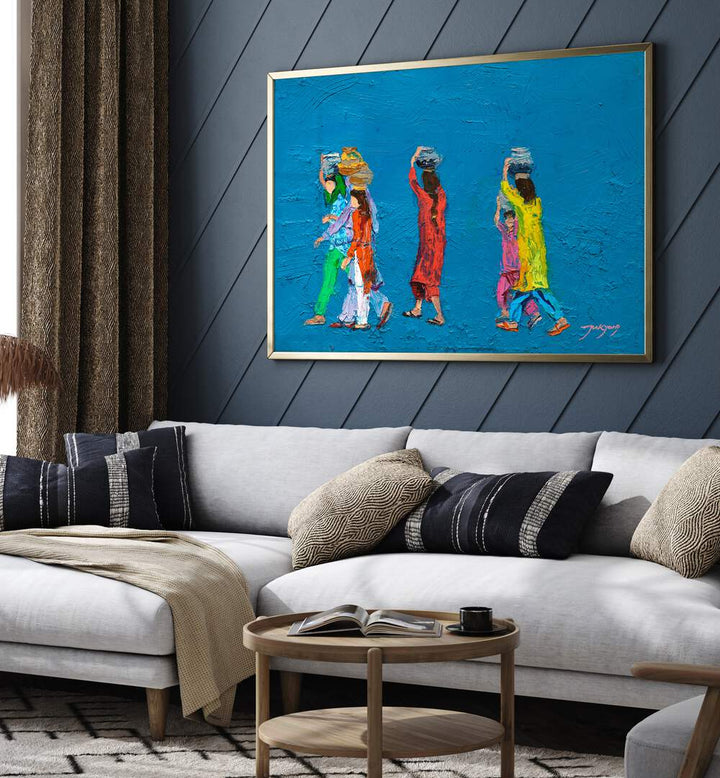 Colorful WOMEN WITH BASKETS, INDIAN ART PAINTINGS displayed elegantly above a modern sofa in a stylish living room.