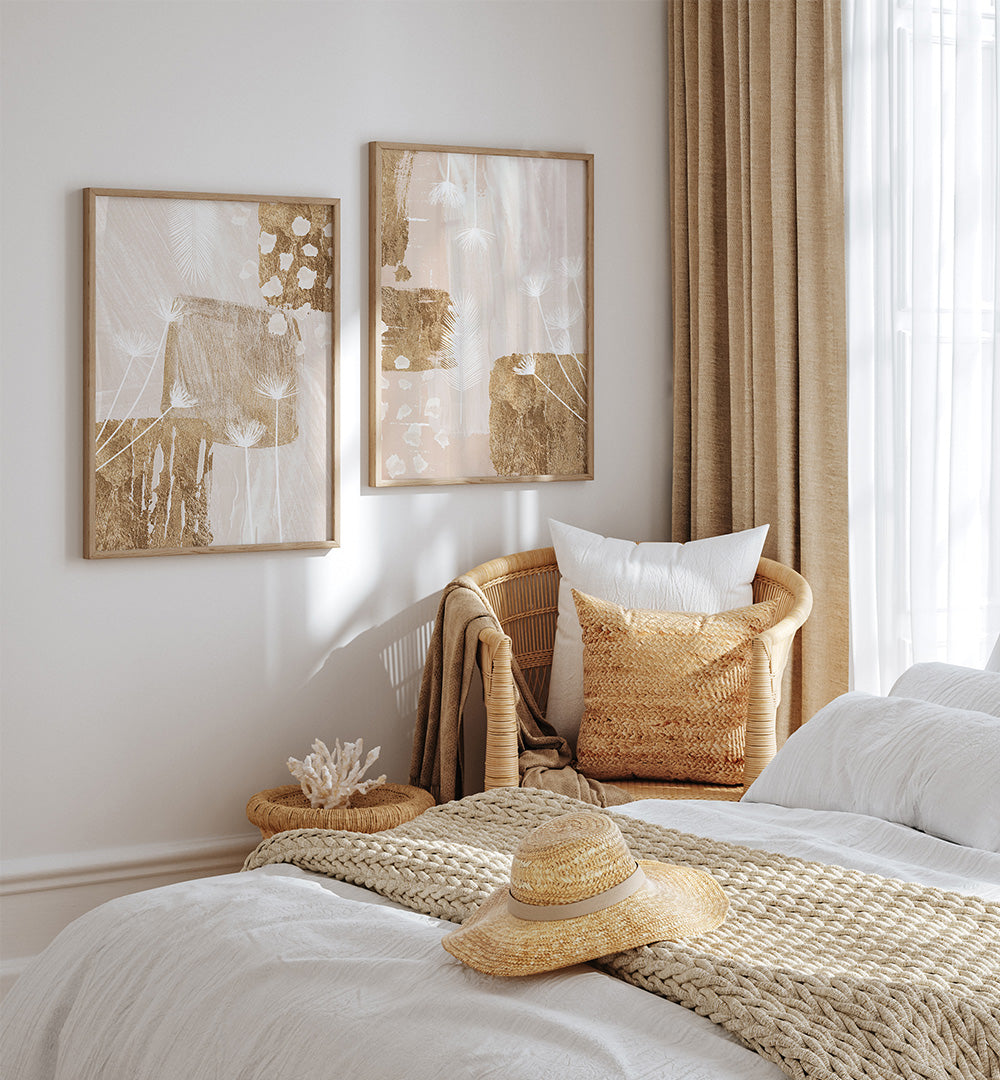 Cozy bedroom with abstract art, wicker chair, and straw hat on bed