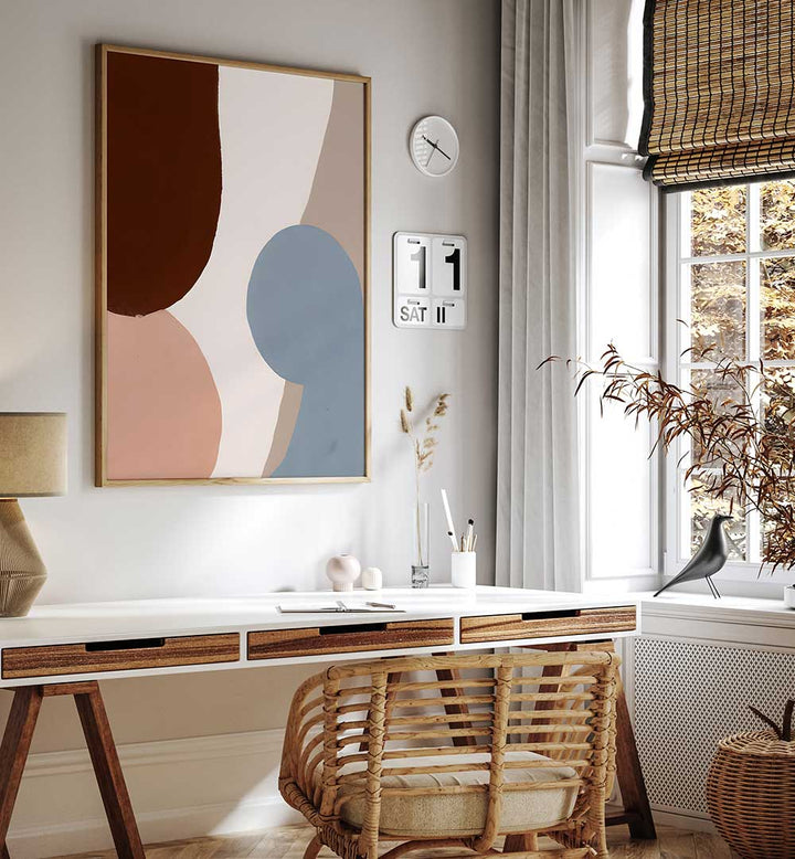 EARTHY CURVES, ABSTRACT PAINTINGS with organic shapes and warm earth tones in a cozy modern workspace setting.