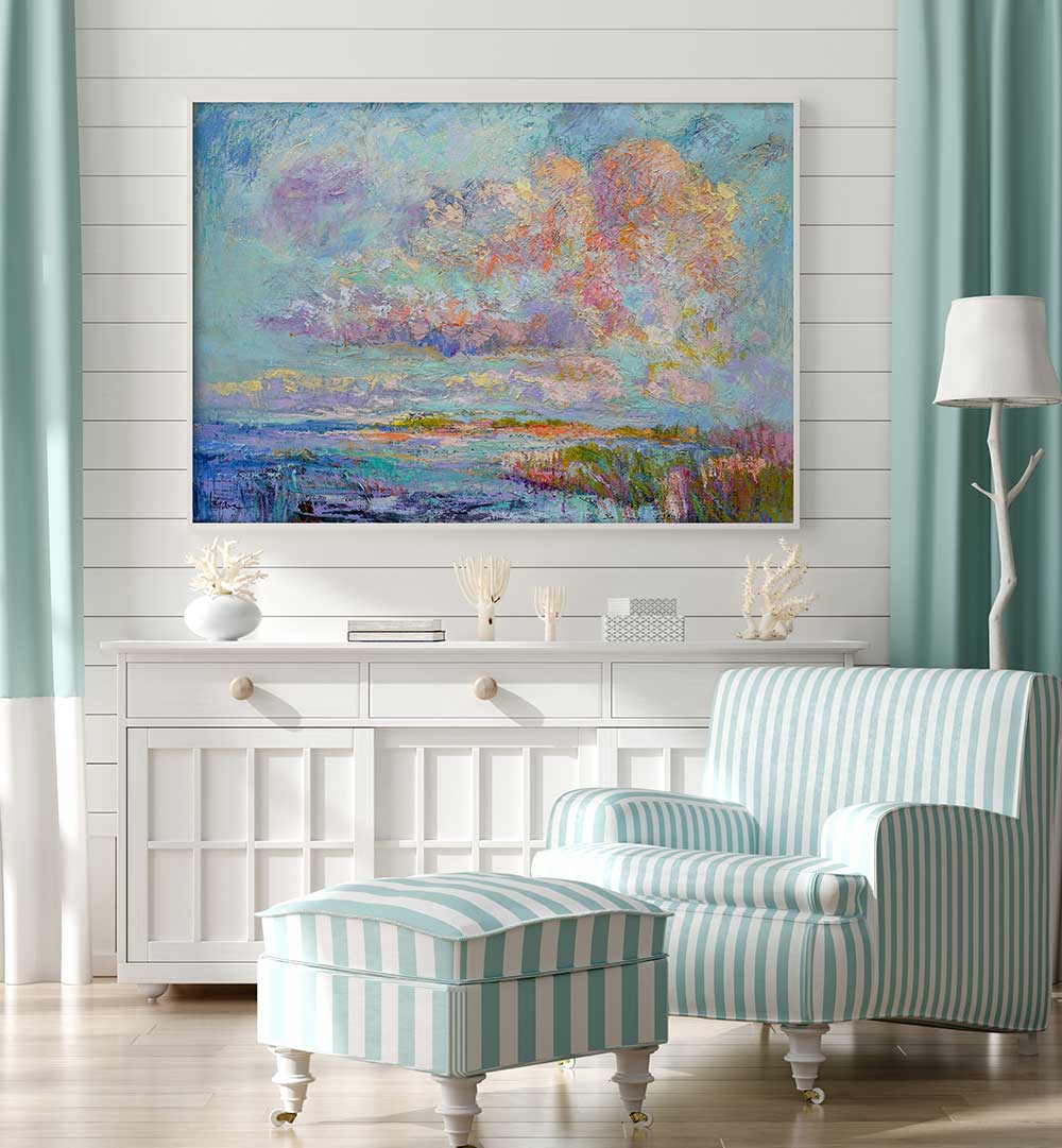 DREAMSCAPE HUES , LANDSCAPE PAINTINGS pastel seascape above white console with striped armchair