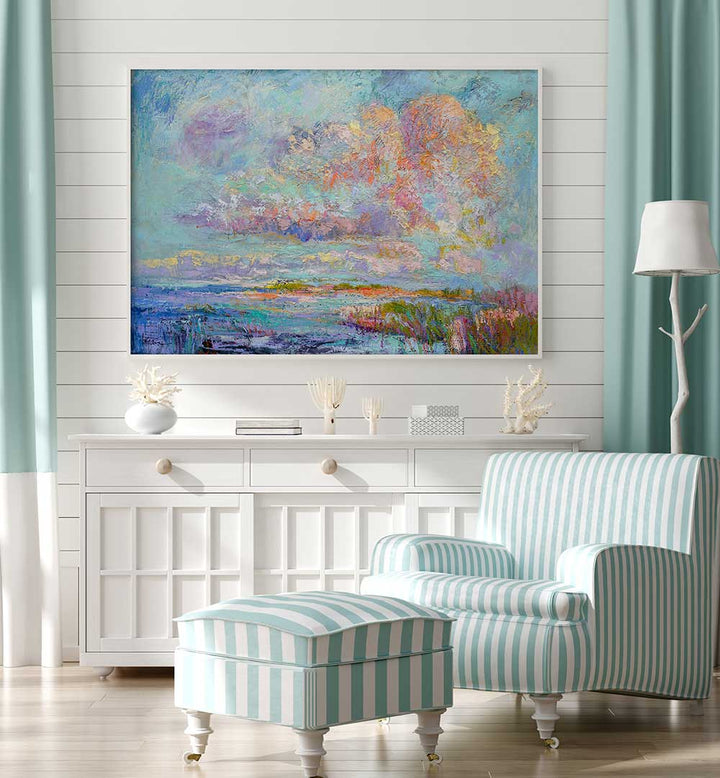 DREAMSCAPE HUES , LANDSCAPE PAINTINGS pastel seascape above white console with striped armchair