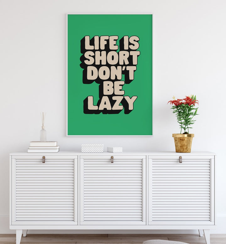Transform your space with the "LIFE IS SHORT DON'T BE LAZY, QUOTES" typography poster by Brett Wilson.