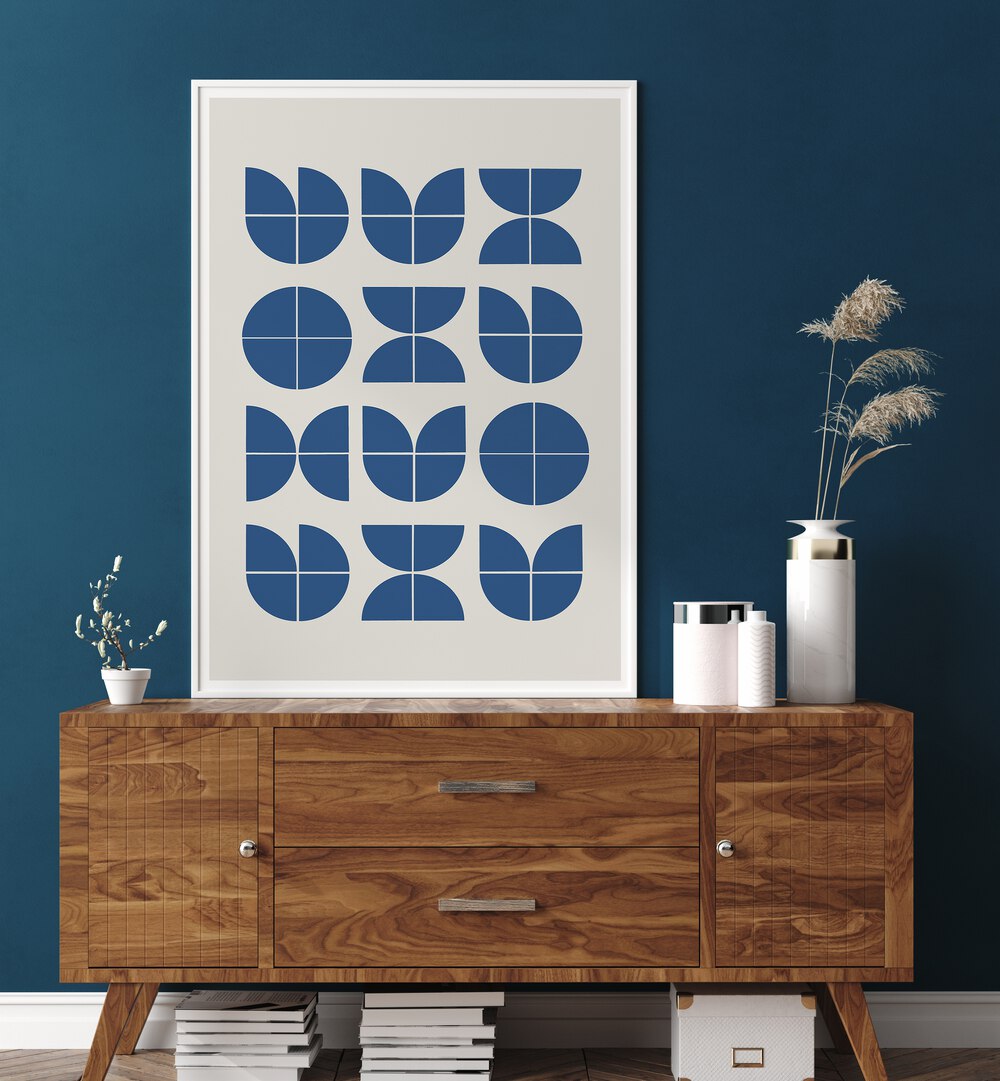 Explore BAUHAUS OBJECTS, GEOMETRIC ART PRINTS by MIUUS STUDIO, featuring modern designs on a stylish wall display.