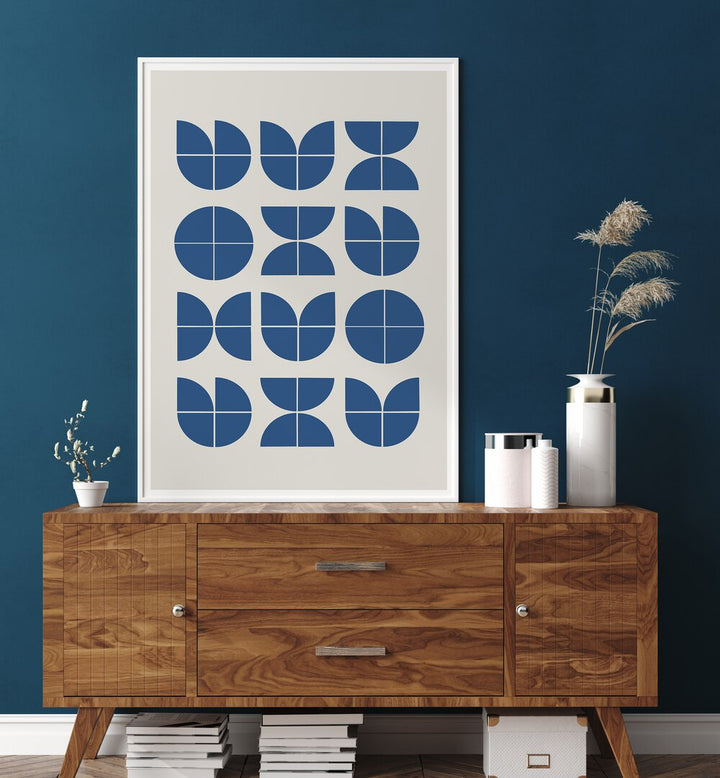 Explore BAUHAUS OBJECTS, GEOMETRIC ART PRINTS by MIUUS STUDIO, featuring modern designs on a stylish wall display.