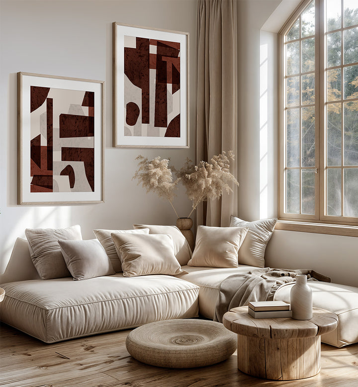 Cozy living room with a beige sofa, abstract art, and natural light.