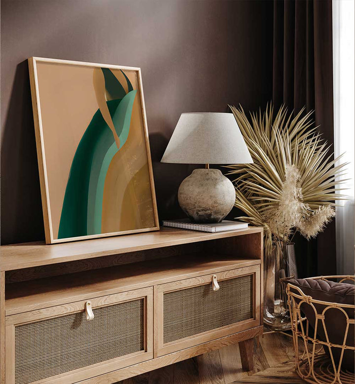 EARTHY DRESS , FASHION POSTERS with natural tones displayed on wood console with lamp and dried plants decor