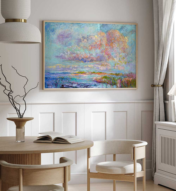 DREAMSCAPE HUES , LANDSCAPE PAINTINGS framed pastel coastal landscape above dining table in modern neutral room