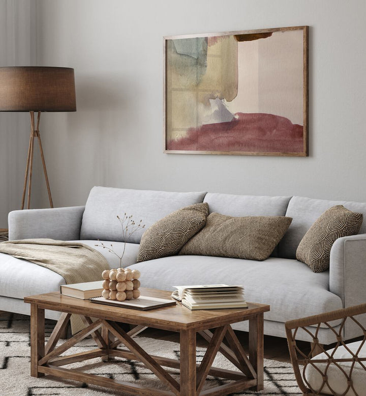 WASHES OF EARTHY TONES, ABSTRACT PAINTINGS enhance a cozy living room with stylish decor and soothing colors.