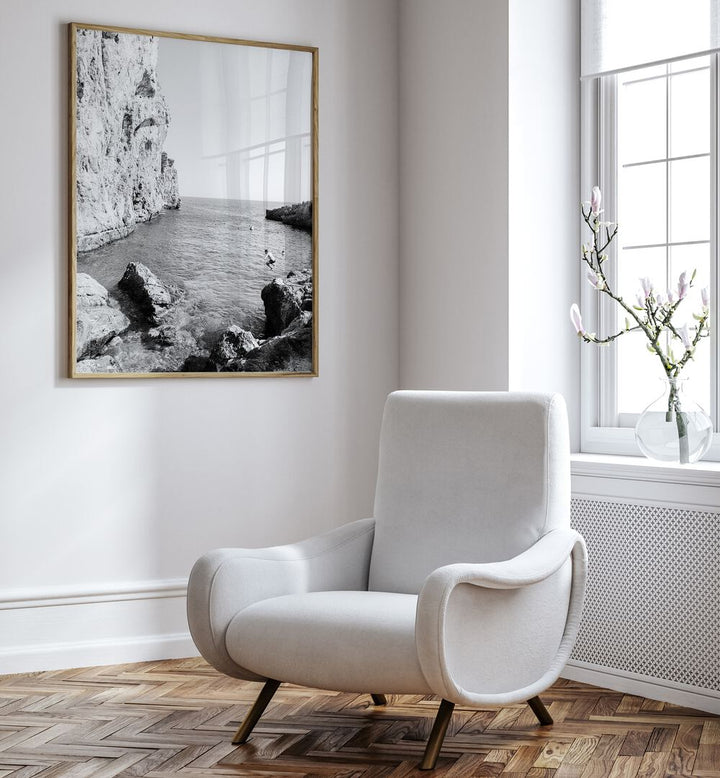 Elegant interior featuring THE DIVE, BEACH PAINTINGS, showcasing a serene seascape and modern decor.